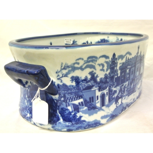 193 - Oval ironstone blue and white footbath with figured scenic decoration & shaped handles