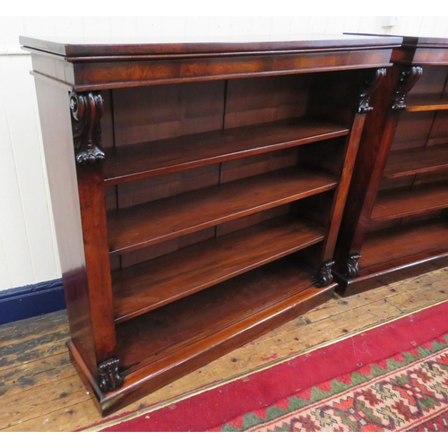 245 - Pair of Edwardian rosewood open bookshelves with scroll decoration, adjustable shelving, on oblong p... 