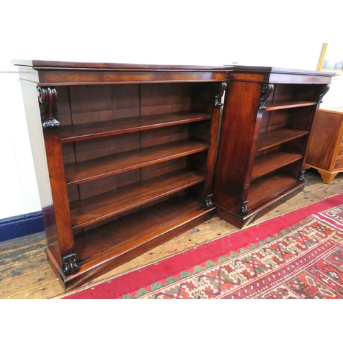 245 - Pair of Edwardian rosewood open bookshelves with scroll decoration, adjustable shelving, on oblong p... 