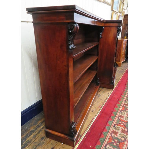 245 - Pair of Edwardian rosewood open bookshelves with scroll decoration, adjustable shelving, on oblong p... 