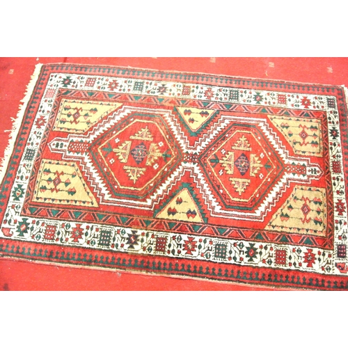 249 - Multi coloured ground hand woven Persian Heriz rug with geometrical design