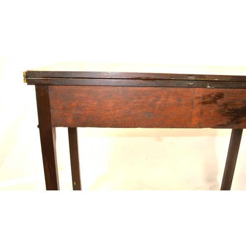 250 - Edwardian mahogany tea table with fold-over top, rounded borders, gateleg support, on square chamfer... 