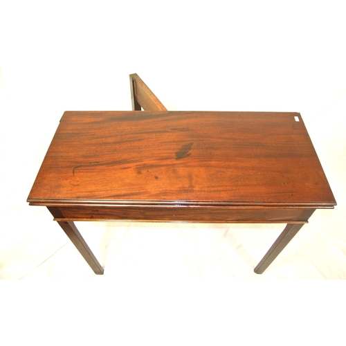 250 - Edwardian mahogany tea table with fold-over top, rounded borders, gateleg support, on square chamfer... 