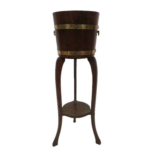 251 - Victorian style oak jardiniere on stand with brass banding & handles, R A Lister & Co, Dursley, Engl... 