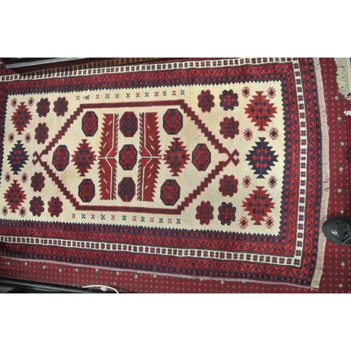 212 - Vintage cream ground Turkman rug with bespoke design