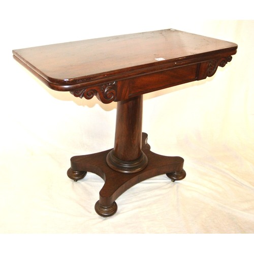 200 - William IV mahogany tea table with swivel fold-over top, scroll frieze, turned tapering column with ... 