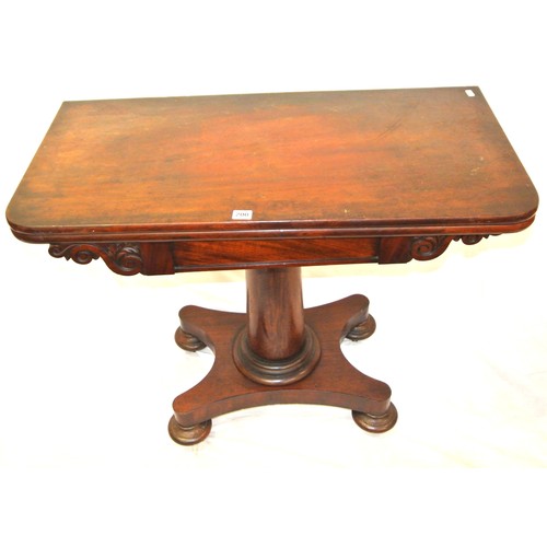 200 - William IV mahogany tea table with swivel fold-over top, scroll frieze, turned tapering column with ... 