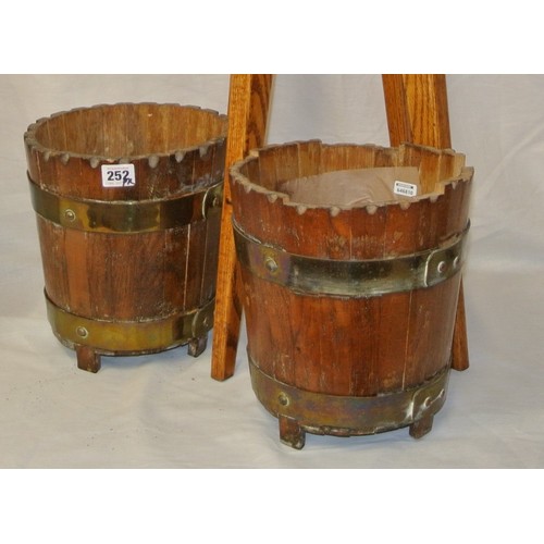 252 - Pair of small timber ice buckets, 'Hand made by Guinness coopers Ireland' with one stand