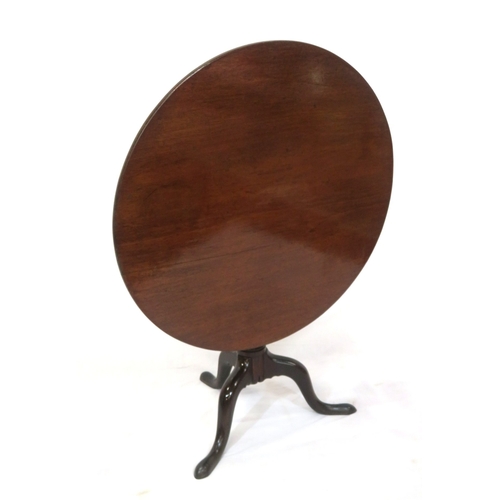 130 - Victorian mahogany round occasional table with tip-up top, ornate vase turned column, on hipped trip... 