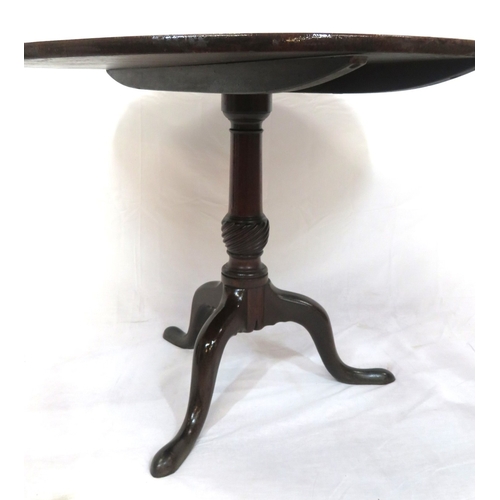 130 - Victorian mahogany round occasional table with tip-up top, ornate vase turned column, on hipped trip... 