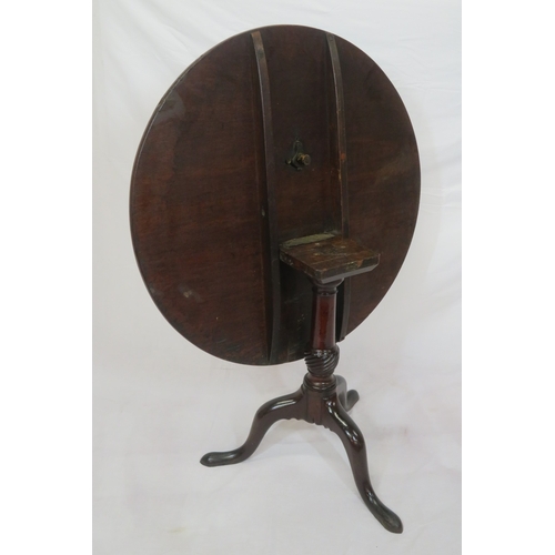 130 - Victorian mahogany round occasional table with tip-up top, ornate vase turned column, on hipped trip... 