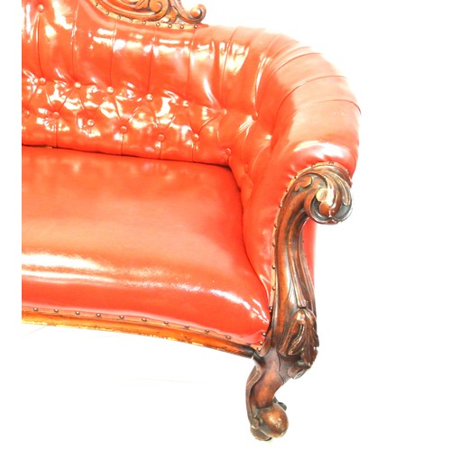 315 - Victorian design couch with scroll decoration, buttoned red leather upholstering, on cabriole legs