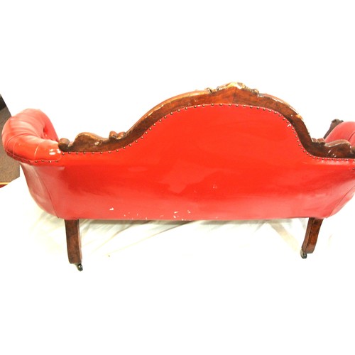 315 - Victorian design couch with scroll decoration, buttoned red leather upholstering, on cabriole legs