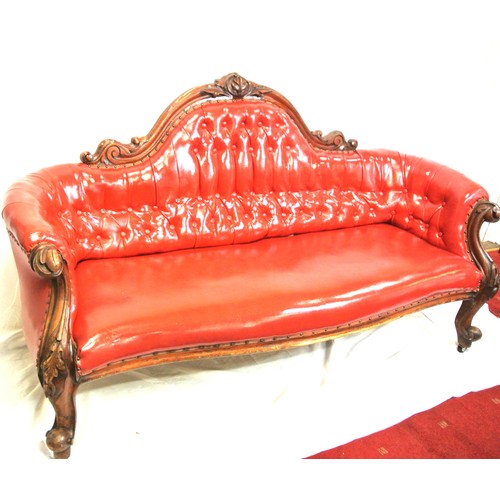 315 - Victorian design couch with scroll decoration, buttoned red leather upholstering, on cabriole legs