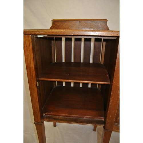 109 - Edwardian inlaid mahogany locker with shelved interior, brass drop handle, on tapering legs