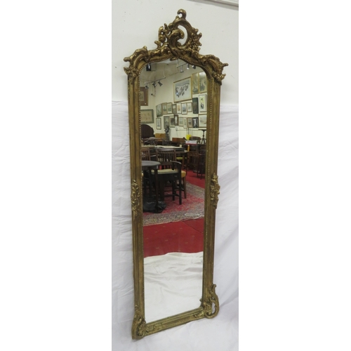 113 - Edwardian design tall gilt framed console mirror with shell & beaded decoration