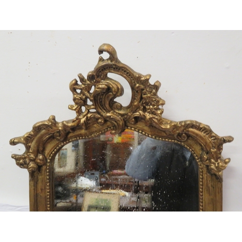 113 - Edwardian design tall gilt framed console mirror with shell & beaded decoration