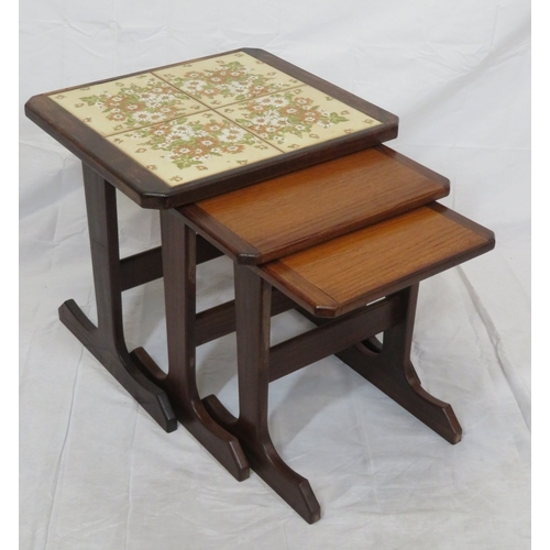 114 - Nest of 3 G-plan tables, top one with tiled insets on oblong plinths
