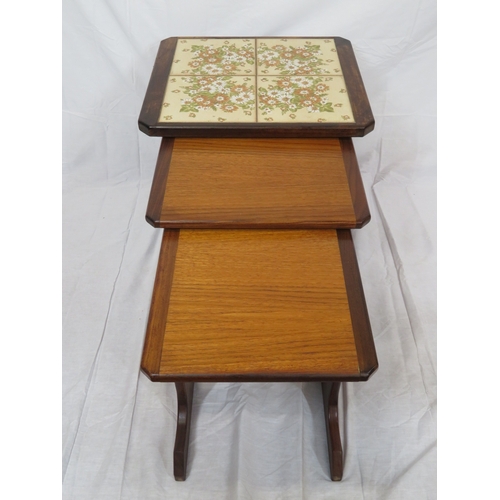 114 - Nest of 3 G-plan tables, top one with tiled insets on oblong plinths