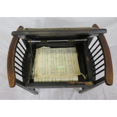 124 - Edward piano stool with upholstered lift-up lid, railed sides, on tapering legs with stretchers