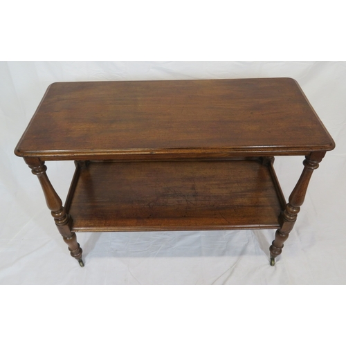 125 - Victorian mahogany 2-tier dumbwaiter with rounded corners, baluster turned columns, on castors