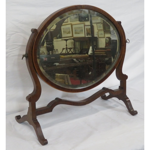 153 - Edwardian mahogany oval bevelled glass swivel mirror with shaped columns & stretcher, on bracket fee... 