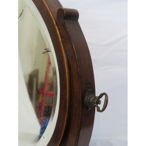 153 - Edwardian mahogany oval bevelled glass swivel mirror with shaped columns & stretcher, on bracket fee... 