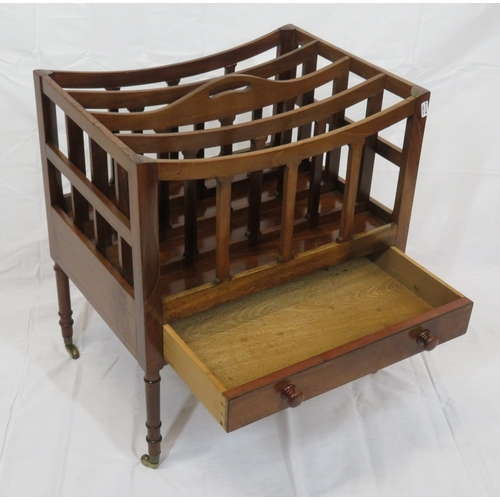 169 - Victorian mahogany 4 section canterbury with shaped rails, frieze drawer, turned legs with castors