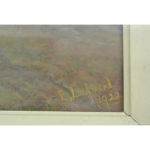 41 - E Lockwood 'Figures looking out to sea' oil on board 28x45cm signed