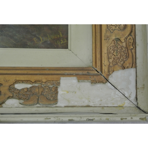 41 - E Lockwood 'Figures looking out to sea' oil on board 28x45cm signed