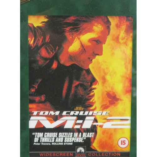 64 - Tom Cruise 'Mission Impossible II' DVD gold disc collection, framed with certificate from Our Price ... 