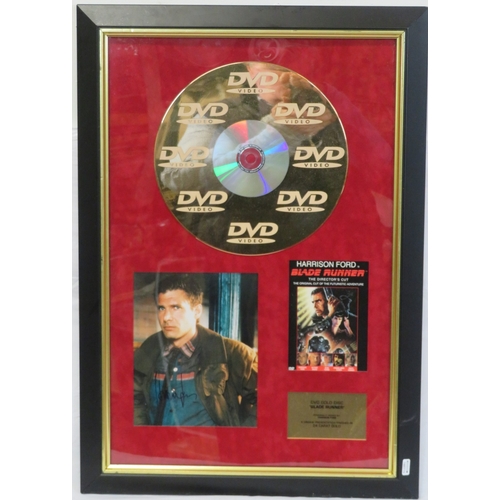 65 - Harrison Ford 'Blade Runner' DVD gold disc collection, framed with certificate from Our Price PLC, H... 