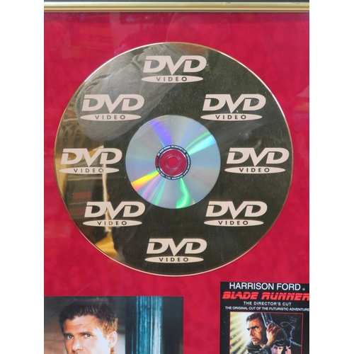 65 - Harrison Ford 'Blade Runner' DVD gold disc collection, framed with certificate from Our Price PLC, H... 