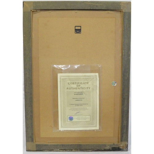 65 - Harrison Ford 'Blade Runner' DVD gold disc collection, framed with certificate from Our Price PLC, H... 