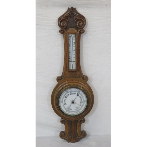 148 - Edwardian style oak barometer with thermometer & aneroid barometer with scroll decoration