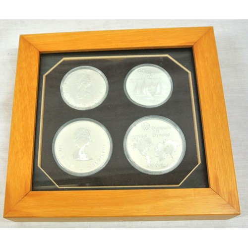 87 - Montreal Olympic 1976 - set of 4 silver coins - two each $5 and $10 Dollars, in presentation case