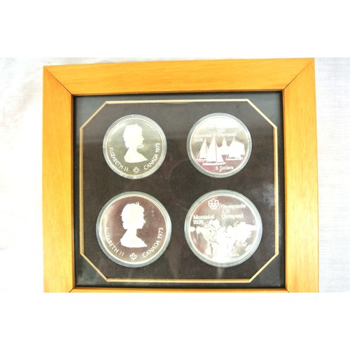 87 - Montreal Olympic 1976 - set of 4 silver coins - two each $5 and $10 Dollars, in presentation case