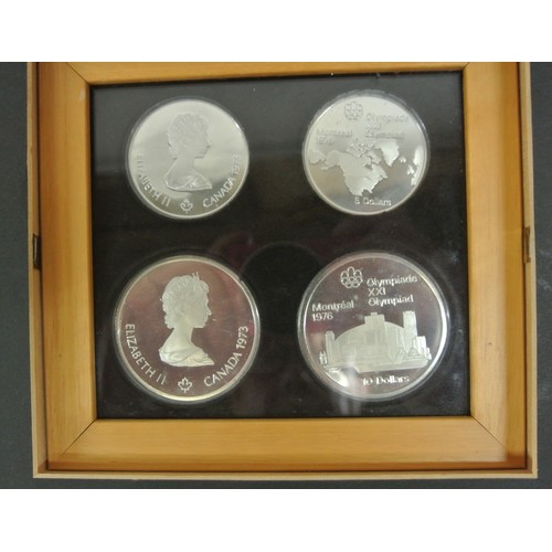 87 - Montreal Olympic 1976 - set of 4 silver coins - two each $5 and $10 Dollars, in presentation case