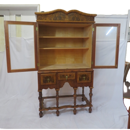 70 - French design mahogany & walnut cabinet with serpentine top, glazed doors and shelved interior,3 inl... 