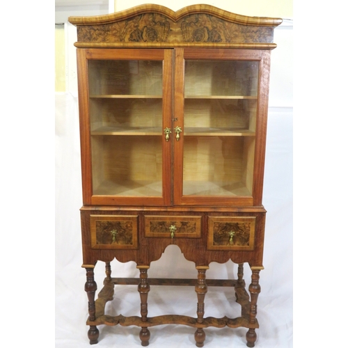 70 - French design mahogany & walnut cabinet with serpentine top, glazed doors and shelved interior,3 inl... 