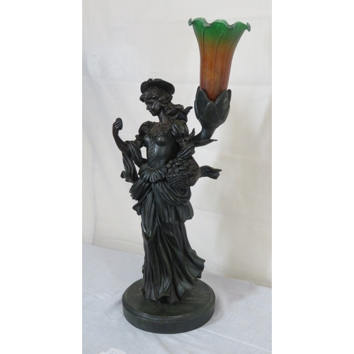 289 - Bronzed electric lamp with figure of an apple seller, on round base