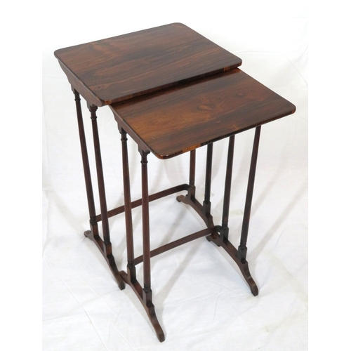 Nest of 2 rosewood graduated tables with turned columns, stretchers and ...