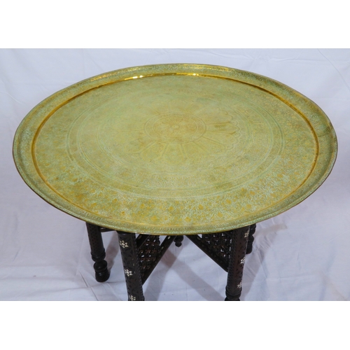 84 - Large round Benares brass tray table with folding base