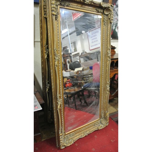 115 - Ornate gilt framed bevelled glass mirror with egg & dart, acanthus leaf & foliate decoration 175x88c... 