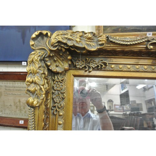 115 - Ornate gilt framed bevelled glass mirror with egg & dart, acanthus leaf & foliate decoration 175x88c... 