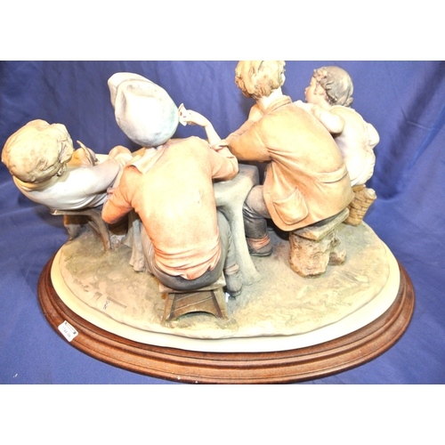 127 - Ornate Capodimonte group of card players, on scroll decorated base on timber stand