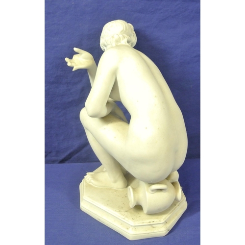 183 - Victorian style parian figure of a kneeling nude with vase, on shaped base