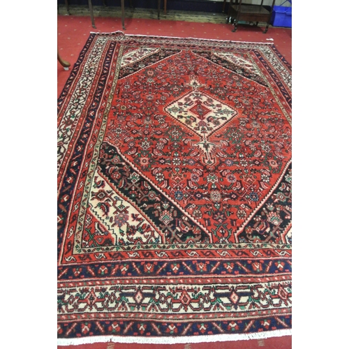 206 - Full pile hand woven Persian Sarouk carpet with geometrical medallion design, 340x240cm
