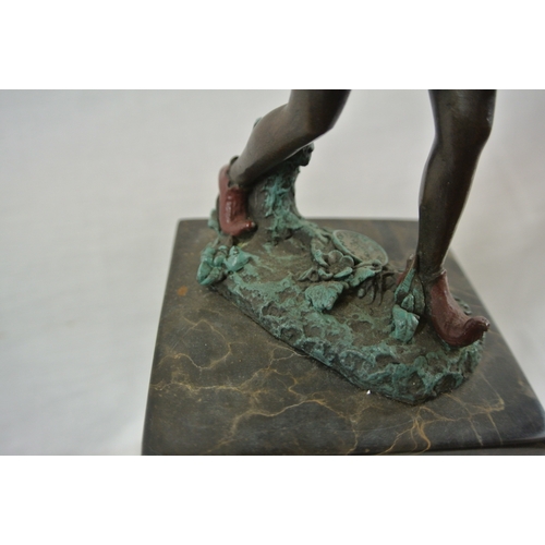 222 - Art deco metal figure of an elf on raised marble base, stamped J B Deposee, Paris