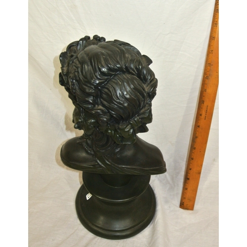 253 - Bust of a young girl on round base